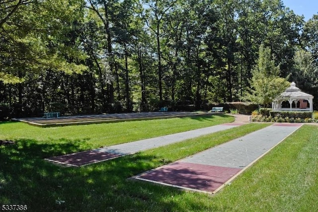 view of home's community featuring a gazebo and a yard