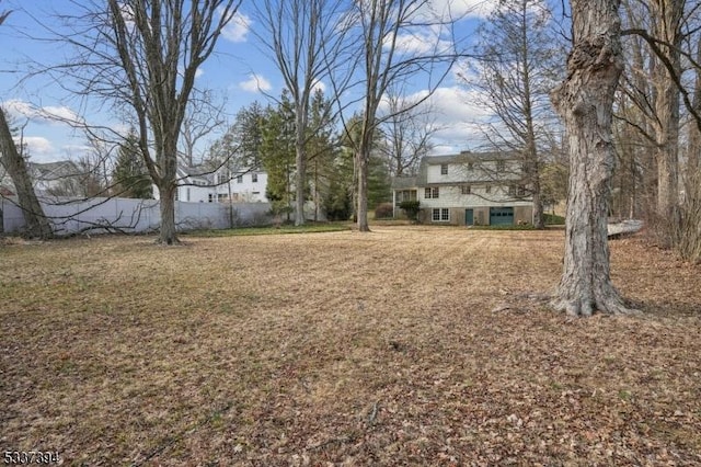 view of yard with fence