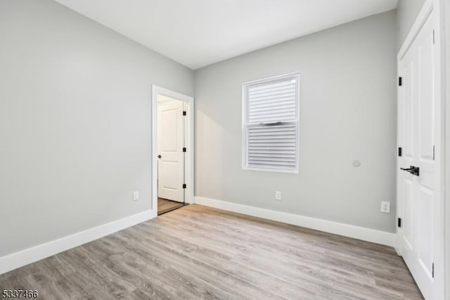 unfurnished bedroom featuring light hardwood / wood-style floors