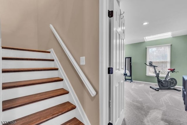 stairs featuring carpet, baseboards, and recessed lighting