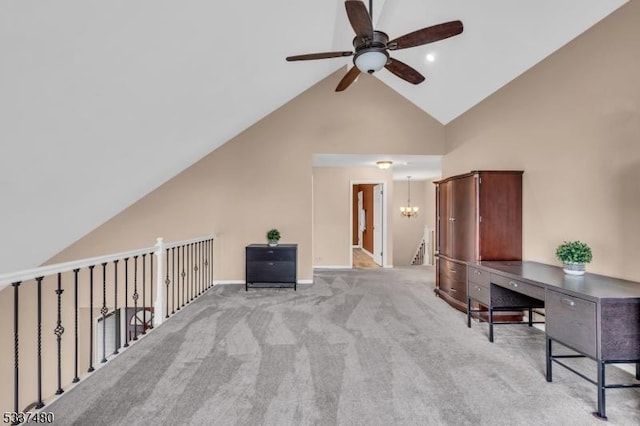 interior space with light carpet, high vaulted ceiling, and ceiling fan with notable chandelier