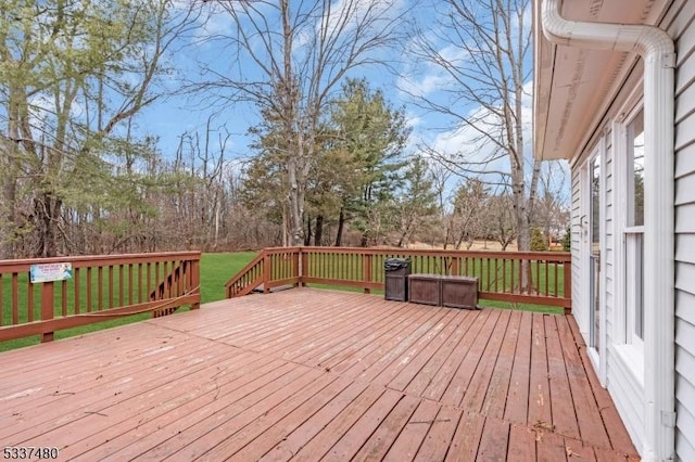 deck featuring a lawn