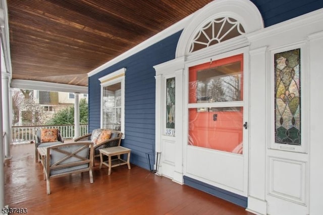 property entrance featuring covered porch