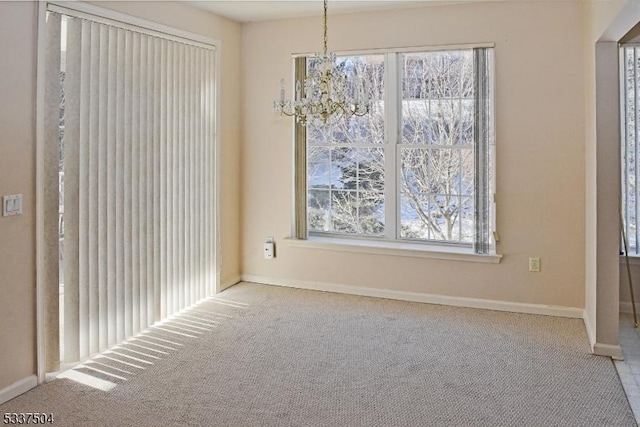 204 Cleveland Ln, Rockaway Twp, NJ 07866 - spare room featuring light carpet and a chandelier