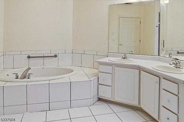 204 Cleveland Ln, Rockaway Twp, NJ 07866 - bathroom featuring a relaxing tiled tub, tile patterned floors, and vanity