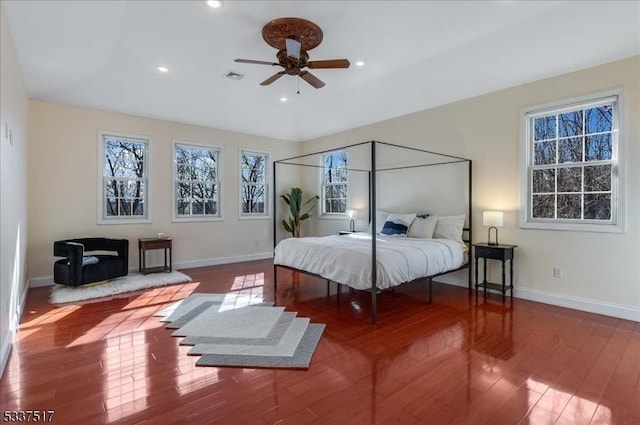 bedroom with ceiling fan and wood-type flooring