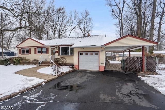 ranch-style home with a garage