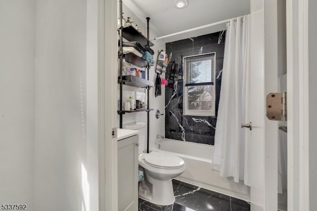 full bathroom with vanity, toilet, and shower / bath combo