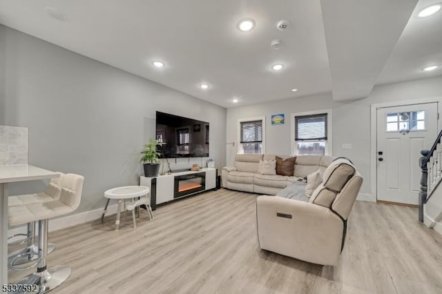 living room with light hardwood / wood-style floors