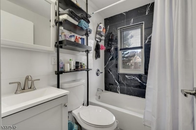 full bathroom featuring vanity, shower / bath combination with curtain, and toilet