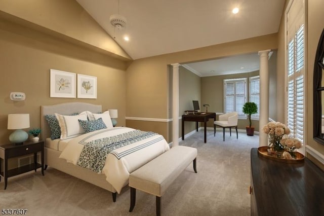 bedroom featuring carpet flooring, baseboards, vaulted ceiling, ornamental molding, and decorative columns