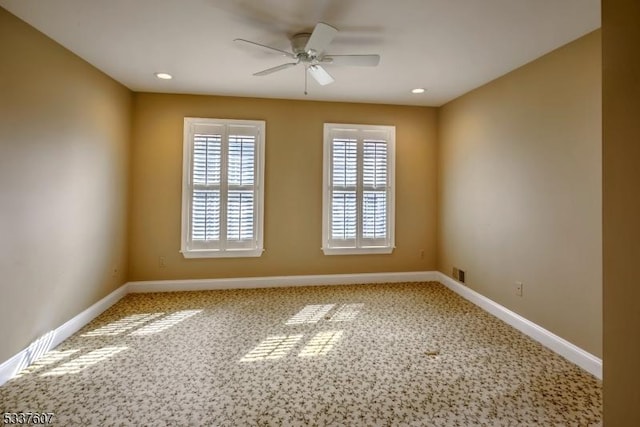 spare room with plenty of natural light, baseboards, ceiling fan, and recessed lighting