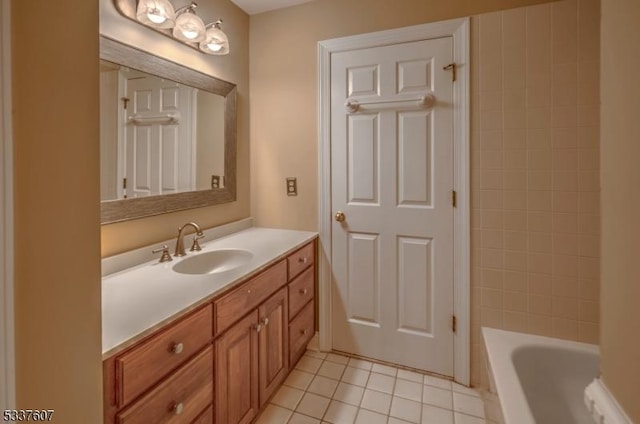 bathroom with vanity and tile patterned floors