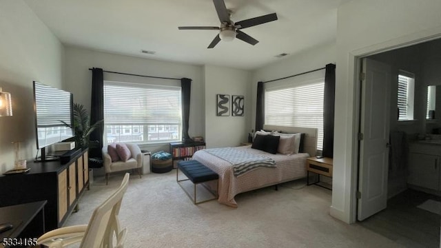 carpeted bedroom with ceiling fan