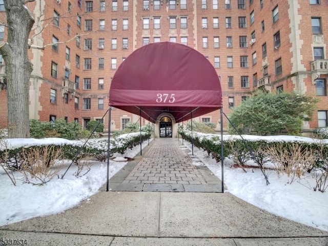 view of snow covered building