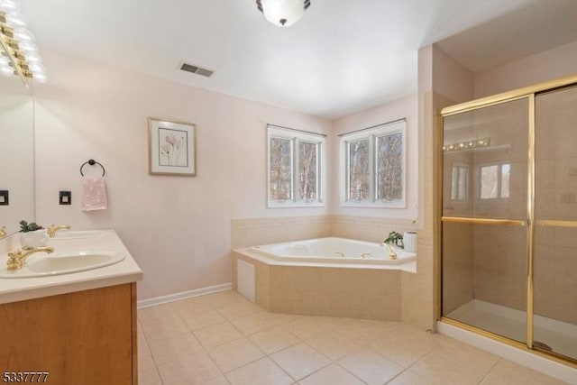 bathroom with tile patterned flooring, a sink, visible vents, a shower stall, and a bath