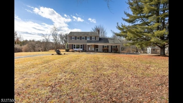 view of front of property with a front lawn