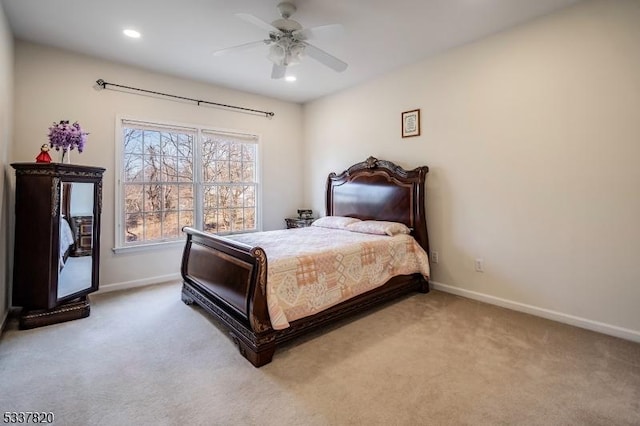 bedroom featuring ceiling fan and carpet floors