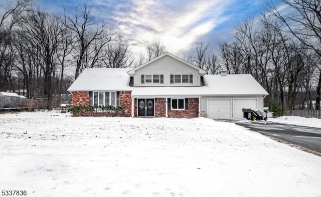 view of front of property featuring a garage