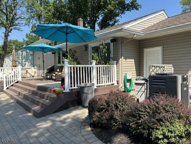 entrance to property with a patio