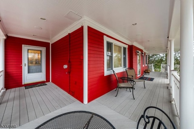 wooden terrace with covered porch