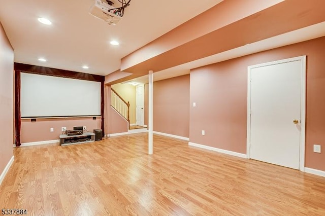 home theater room featuring recessed lighting, baseboards, and light wood-style floors