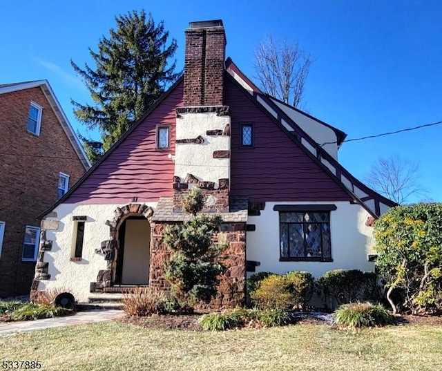 view of property exterior featuring a lawn