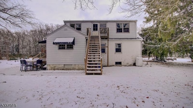 view of snow covered property