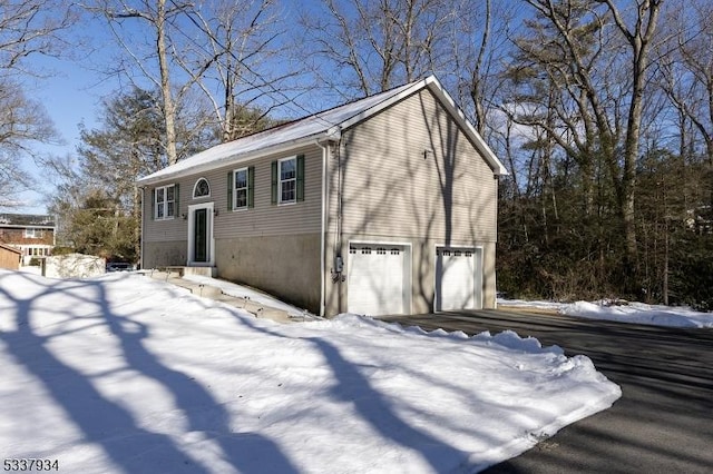 exterior space with a garage