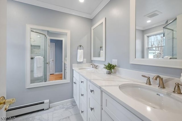 bathroom with marble finish floor, baseboard heating, a sink, and a shower stall