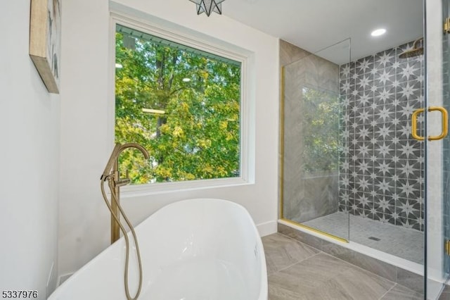 bathroom with parquet floors and independent shower and bath