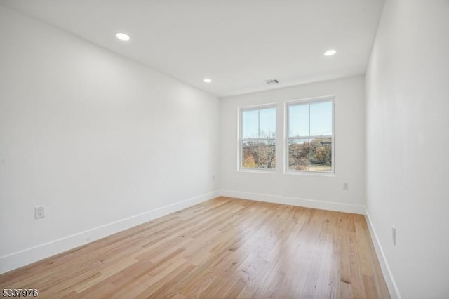 empty room featuring light hardwood / wood-style flooring