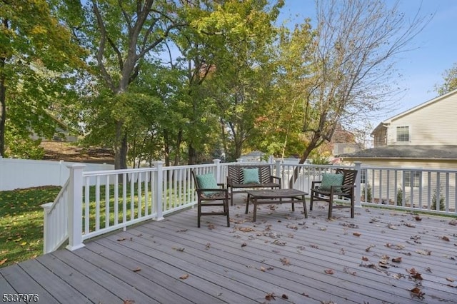 wooden deck with an outdoor hangout area