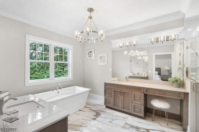 ensuite bathroom featuring vanity, baseboards, marble finish floor, a soaking tub, and crown molding