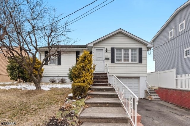 view of front of house with a garage