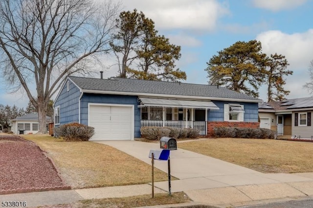 single story home featuring a garage, a porch, and a front lawn