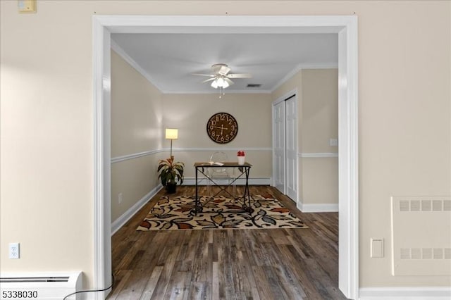 94 Brookville Hollow Rd, Delaware Twp, NJ 08559 - hallway featuring visible vents, ornamental molding, baseboard heating, and wood finished floors