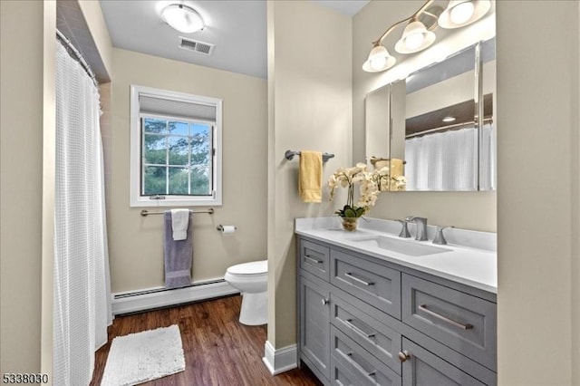 94 Brookville Hollow Rd, Delaware Twp, NJ 08559 - full bath featuring vanity, toilet, wood finished floors, a baseboard radiator, and visible vents