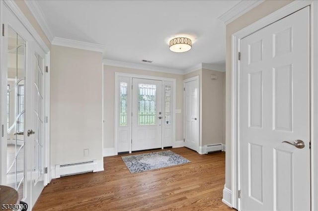 94 Brookville Hollow Rd, Delaware Twp, NJ 08559 - entryway featuring crown molding, baseboards, baseboard heating, and light wood-style floors