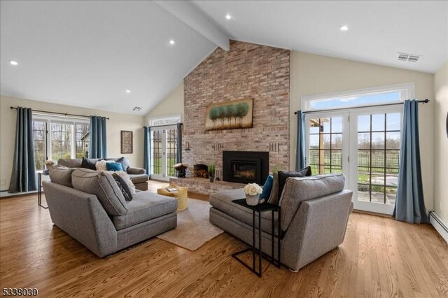 94 Brookville Hollow Rd, Delaware Twp, NJ 08559 - living room with visible vents, a brick fireplace, light wood-type flooring, high vaulted ceiling, and beamed ceiling