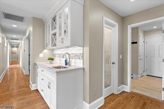 94 Brookville Hollow Rd, Delaware Twp, NJ 08559 - hallway featuring a sink, baseboards, light wood-style floors, and visible vents