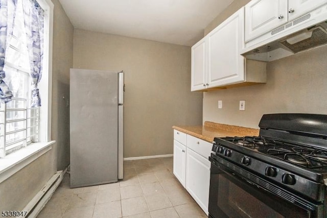 kitchen with stainless steel fridge, a baseboard radiator, black range with gas cooktop, and white cabinets