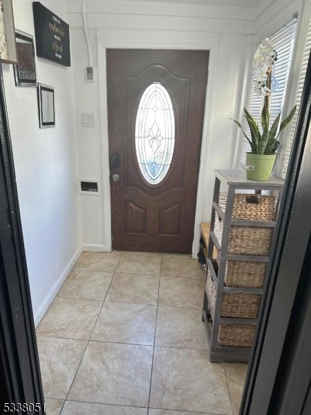 view of tiled entrance foyer