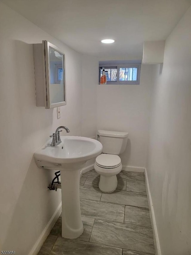 bathroom featuring toilet