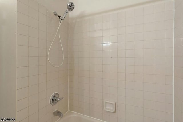 bathroom featuring bathtub / shower combination