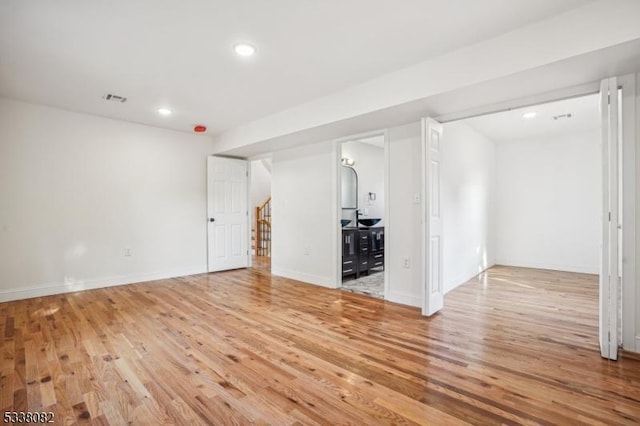 empty room featuring wood-type flooring