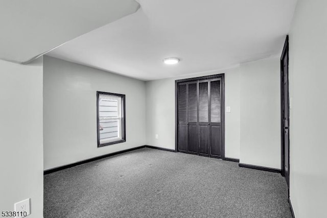 unfurnished bedroom featuring carpet