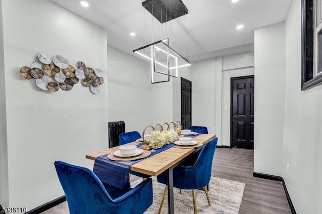 dining area featuring hardwood / wood-style flooring