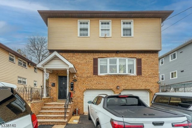 view of front of property with a garage