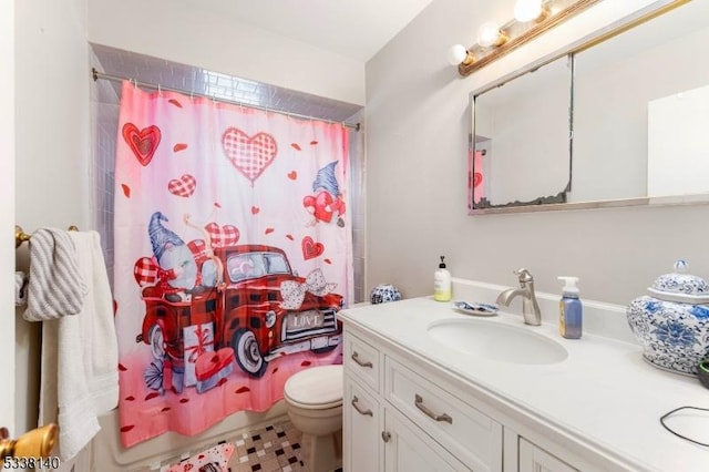 full bathroom with shower / bath combination with curtain, vanity, and toilet